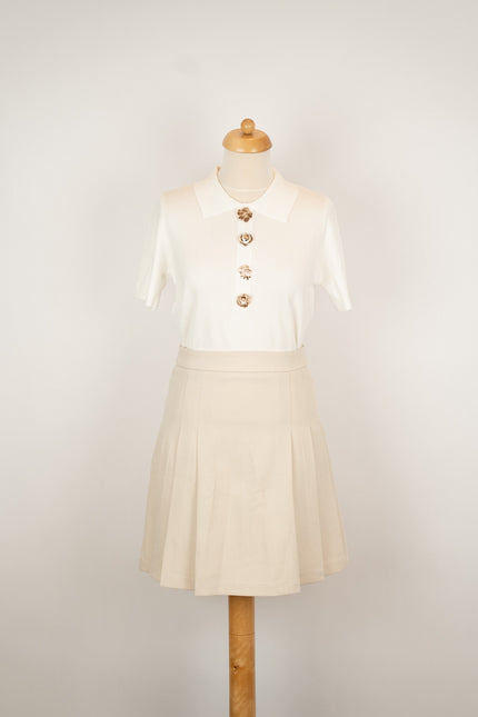 Zandkleur rokje met plooitjes