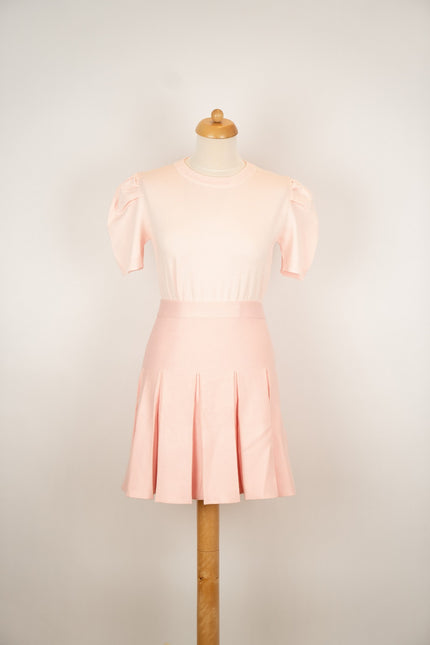 Roze gebreid plooirokje