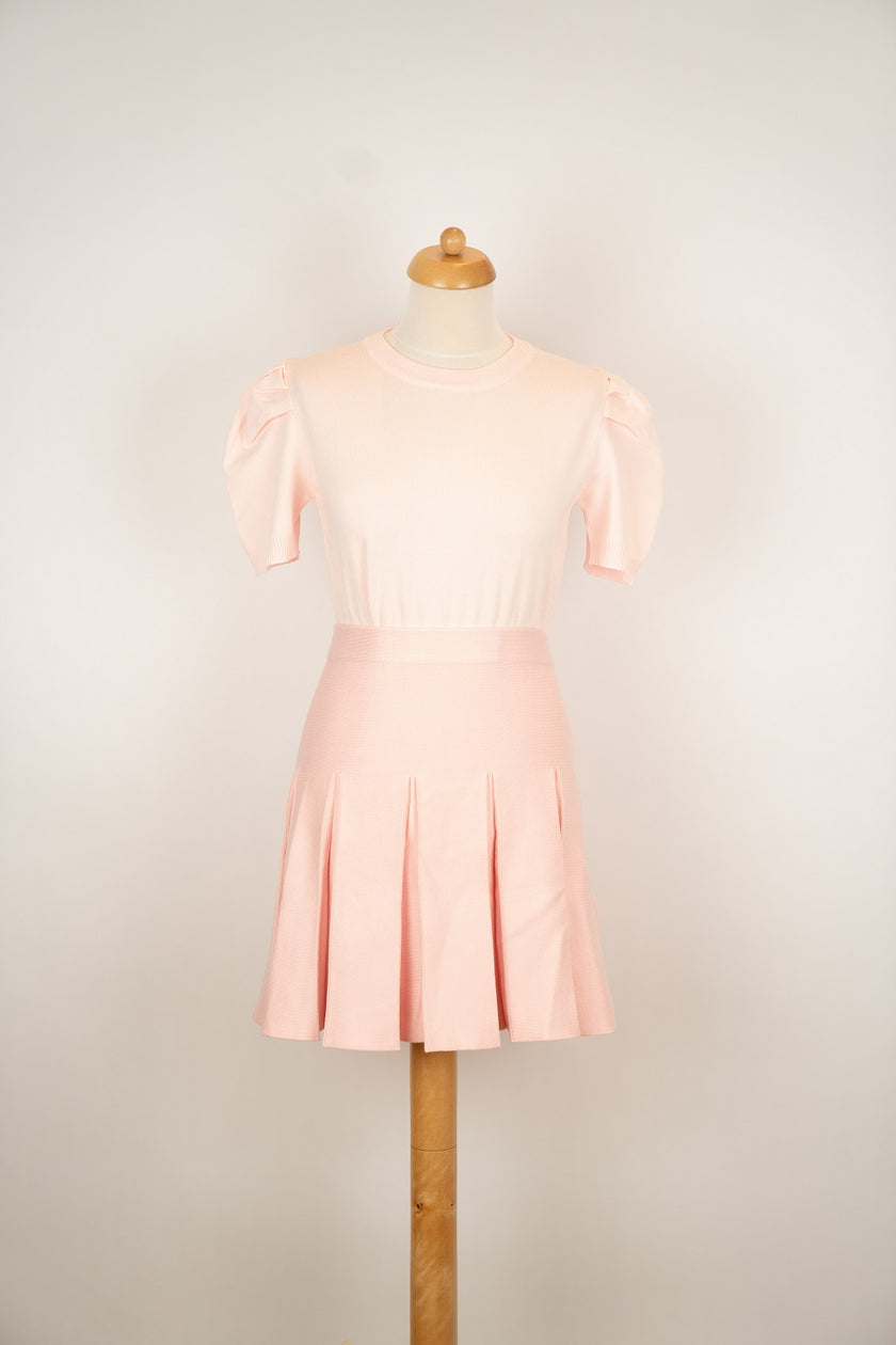 Roze gebreid plooirokje