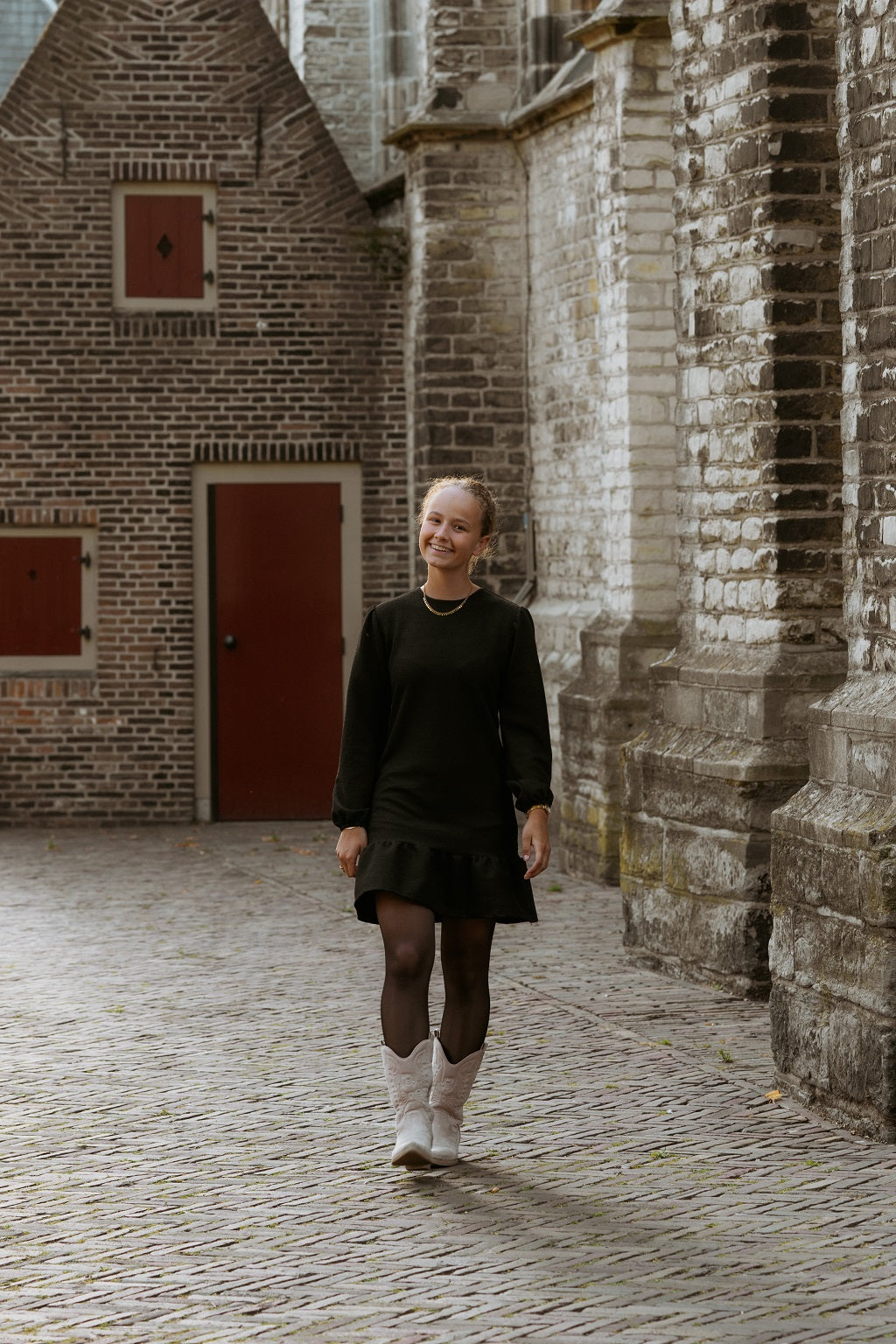 Zwart bouclé jurkje