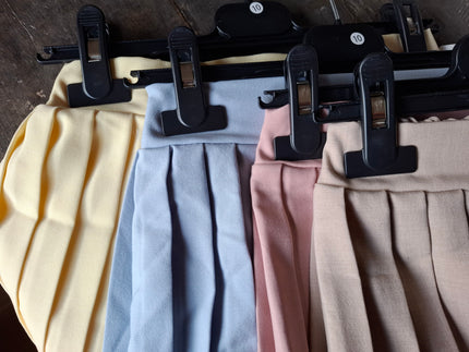 Zandkleur plooirokje, langere lengte