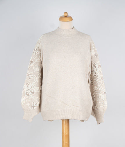 Zandkleur trui met leuke mouw