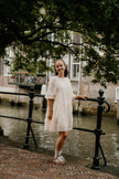 Lichtbeige jurkje  met 3/4 mouw