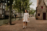 Zandkleur jurk met strik, lange mouw