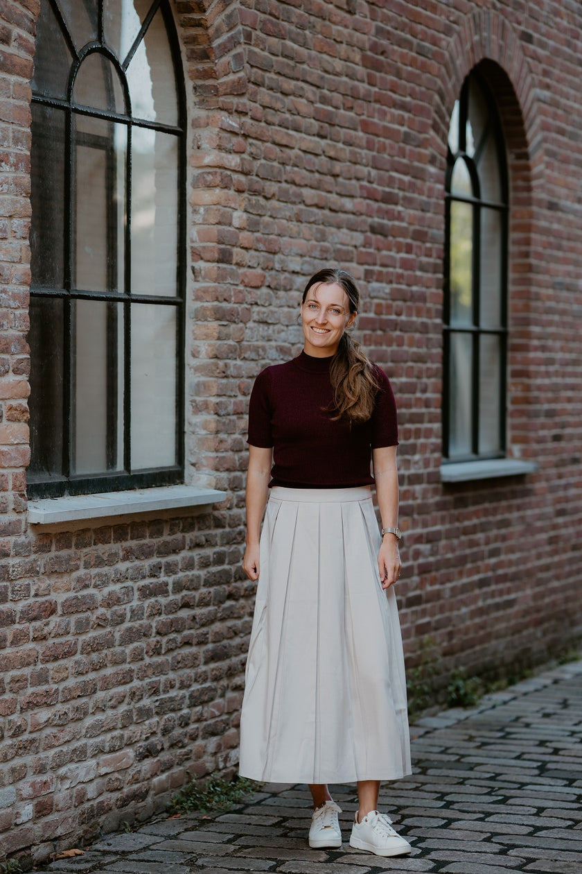 Zandkleur rok met plooien