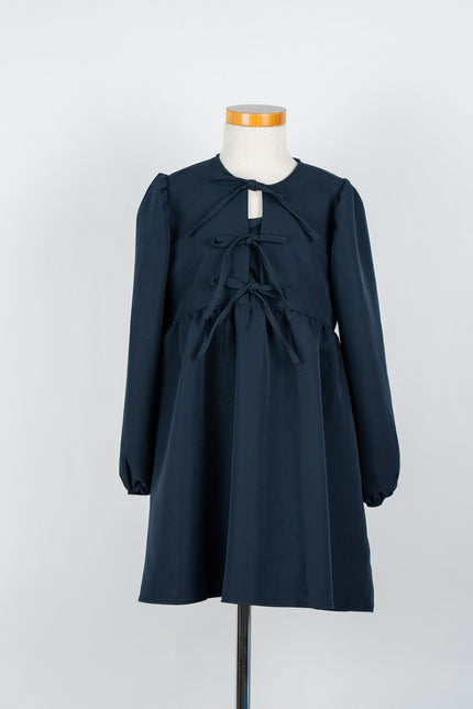 Donkerblauw jurkje met strikjes