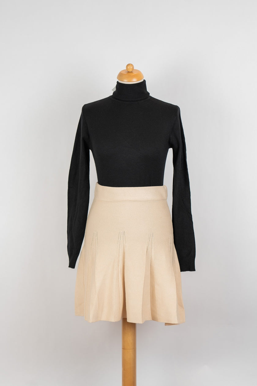 Zandkleur gebreid plooirokje