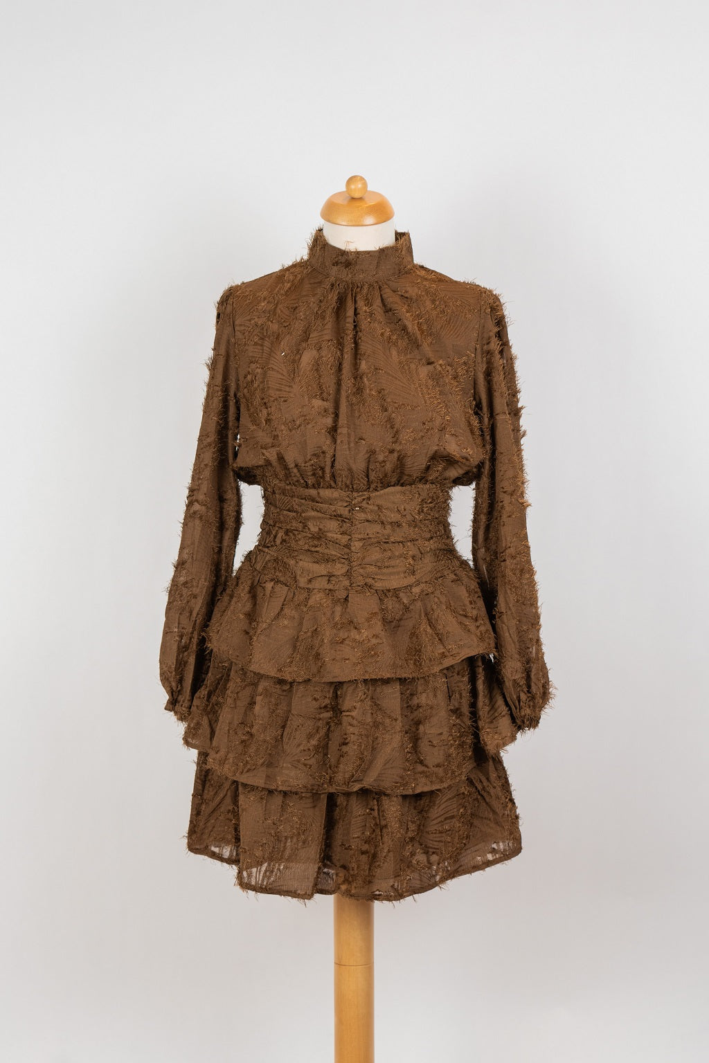 Donkerbruine strokenjurk