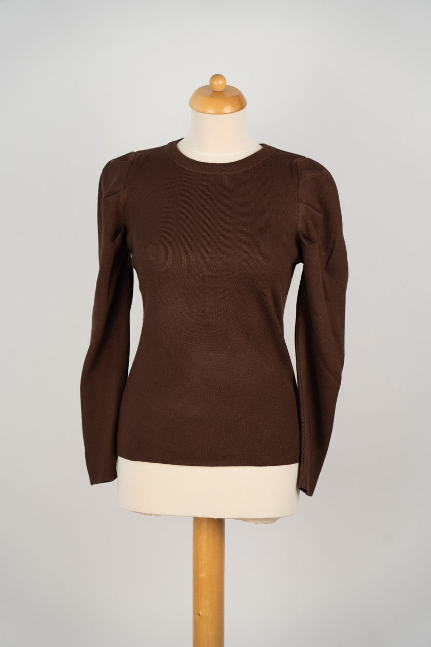 Bruin truitje met pofmouwtje