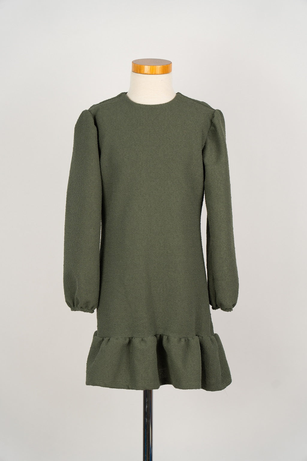 Groen bouclé jurkje