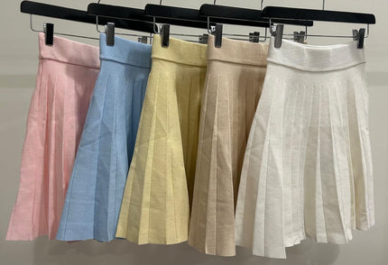 Geel klokkend rokje met plooien