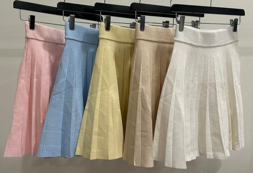 Beige klokkend rokje met plooien