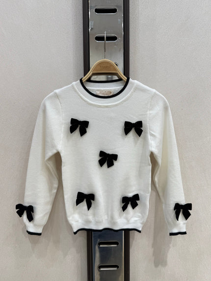 Offwhite truitje met strikken