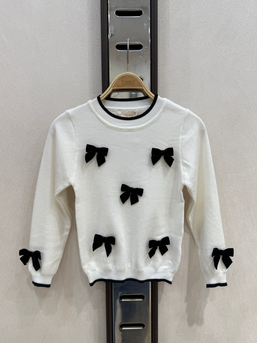 Offwhite truitje met strikken