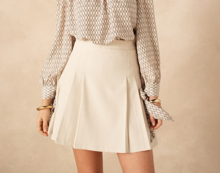 Zandkleur rokje met plooitjes