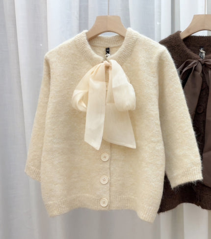 Beige vestje met strik