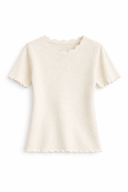 Offwhite truitje met schulpdetails