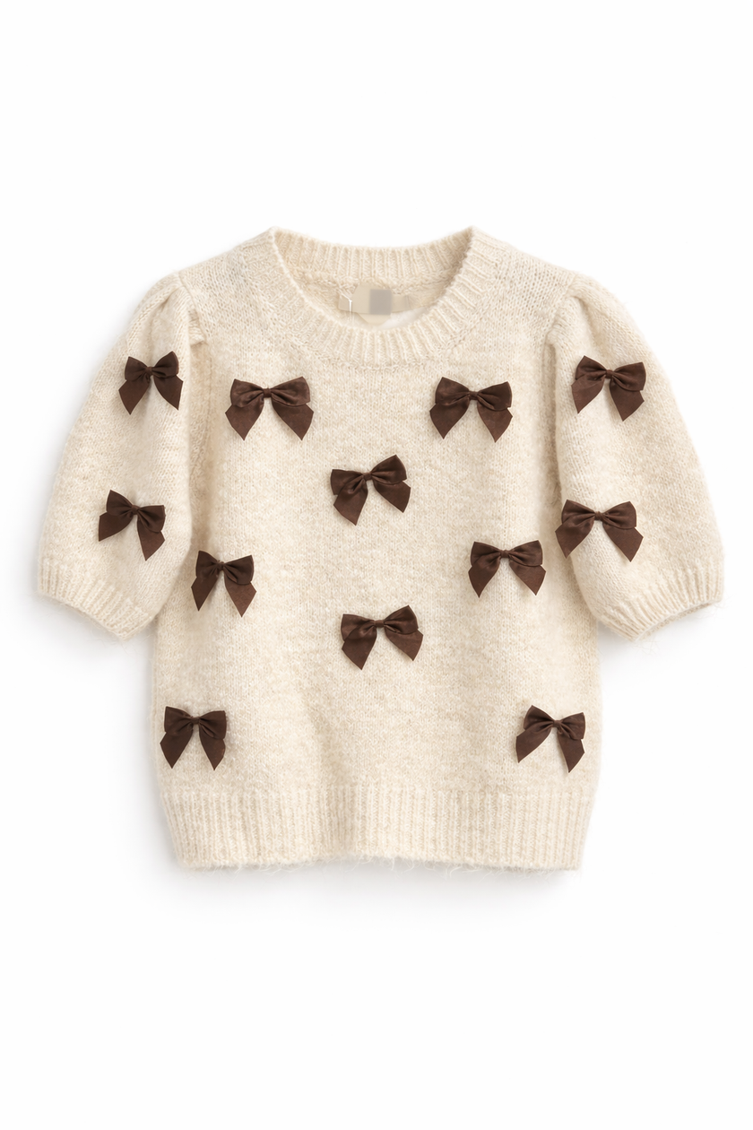 Beige truitje met bruine strikken