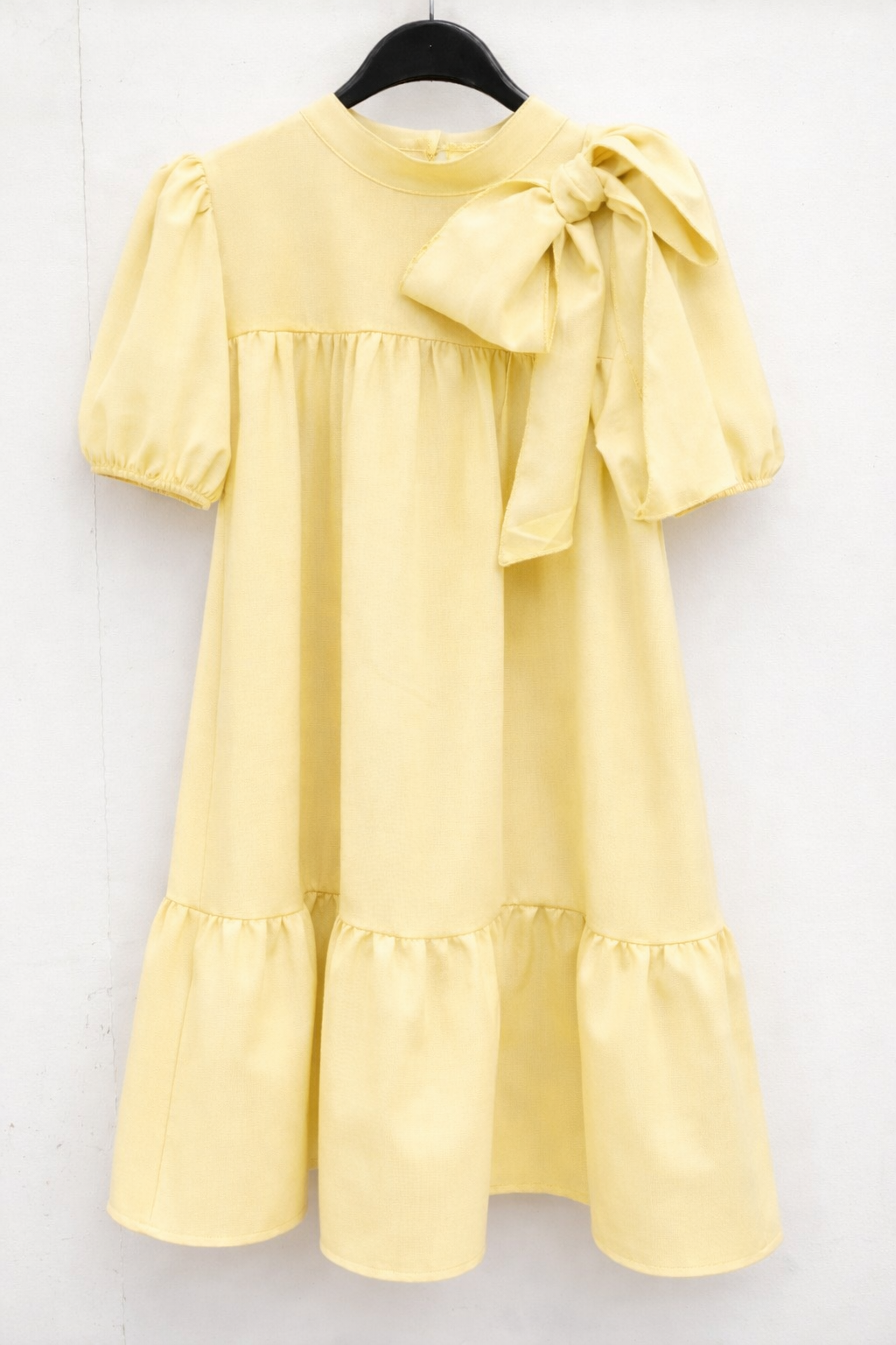 Gele jurk met strik, korte mouw