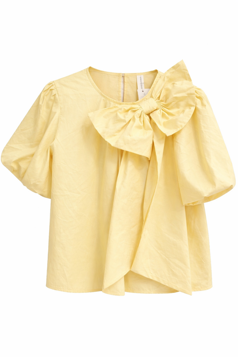 Gele blouse met grote strik