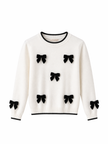 Offwhite truitje met strikken