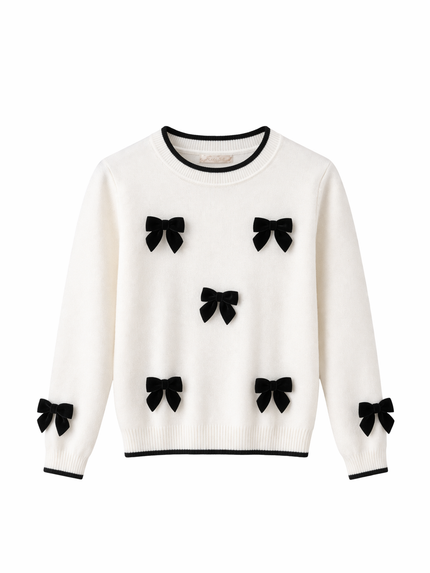 Offwhite truitje met strikken