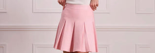 Roze gebreid plooirokje