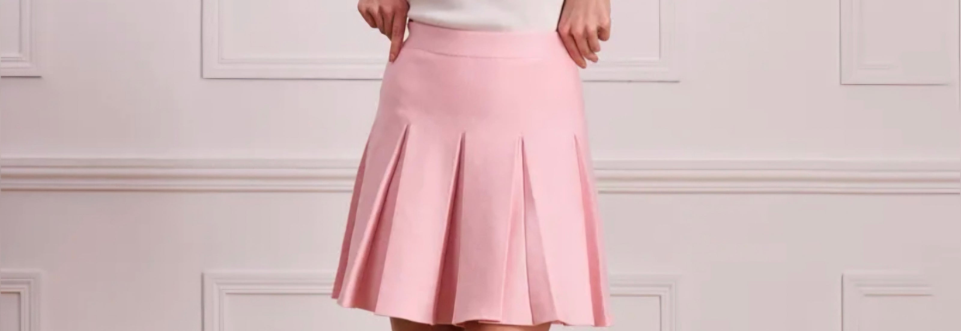 Roze gebreid plooirokje