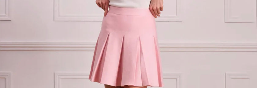 Roze gebreid plooirokje