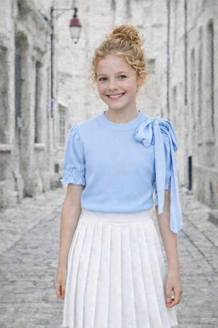 Lichtblauw shirt met royale strik