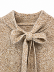 Beige trui met strik