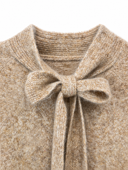 Beige trui met strik