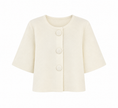 Crème vest met grote knopen