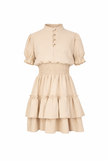 Beige jurkje met gesmokt boord en knoopjes