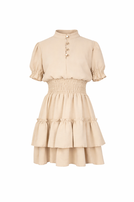 Beige jurkje met gesmokt boord en knoopjes