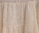 Lichtbeige jurkje  met 3/4 mouw