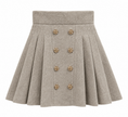 Beige gebreid rokje met knopen