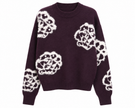 Rode trui met details