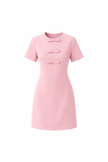 Roze jurkje met strikjes