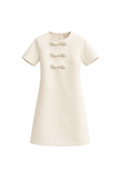 Offwhite jurkje met strikjes