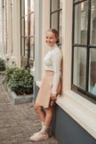 Beige klokkende lederlook rok